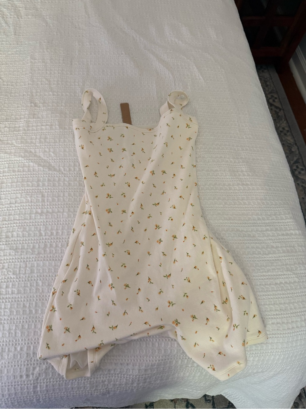 SKIMS Cream Floral Romper with Yellow & Green Accents